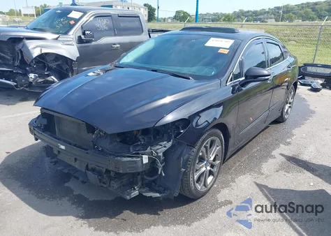 2020 Ford Fusion Hybrid Titanium from USA, damaged, VIN 3FA6P0RU6LR157148